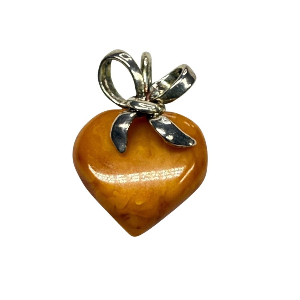 Vintage Baltic Butterscotch Amber and Sterling Heart pendant.